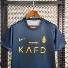 Camisa Al-Nassr Away 2023/24 - Nike Torcedor Masculina - Azul/Amarela