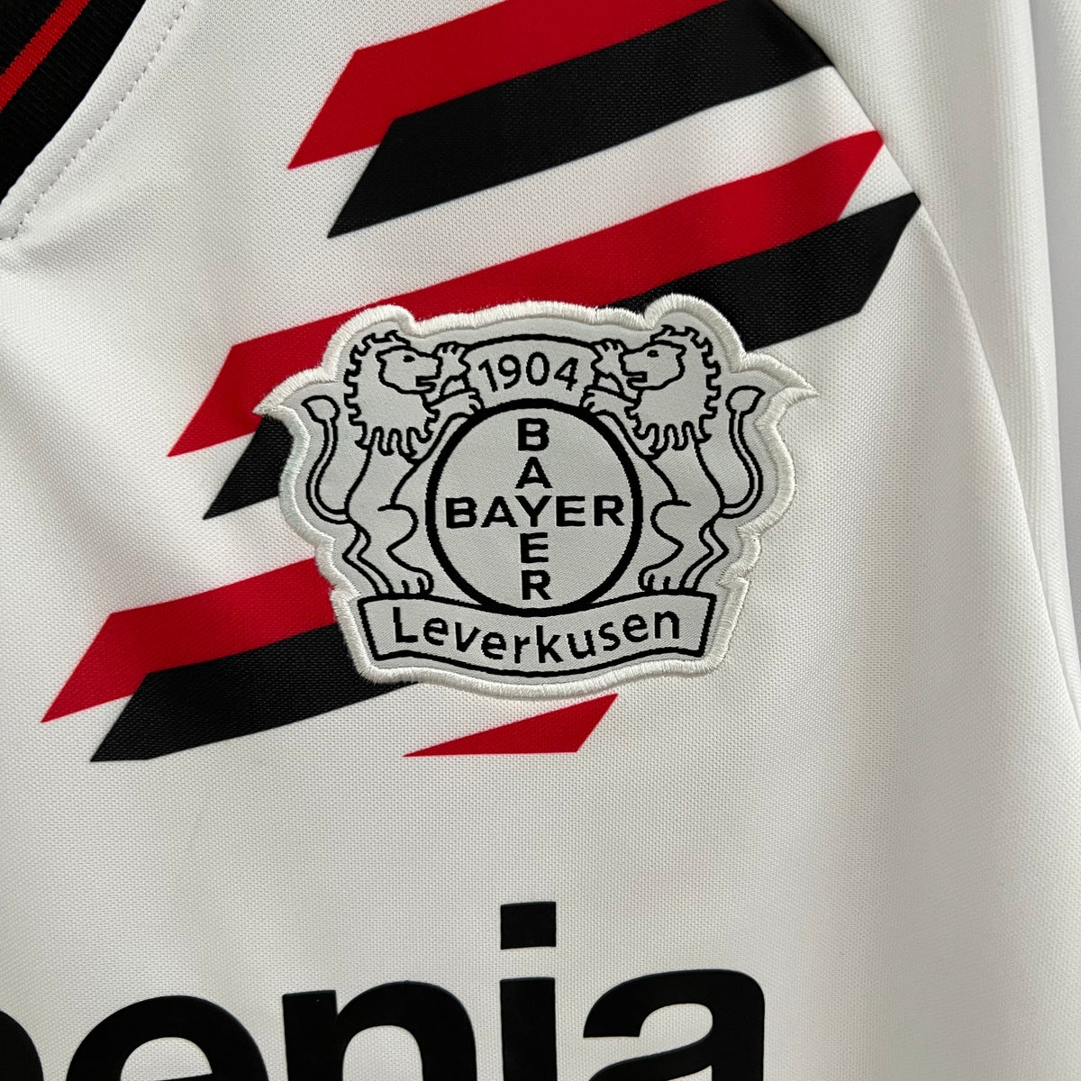 Camisa Bayer Leverkusen Home 2023/24 - Castore Torcedor  Masculina - Branca/Vermelha